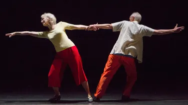Senior performers dancing together