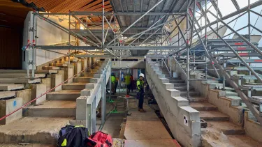 Construction work featuring steps and scaffolding.