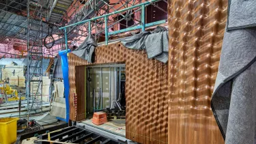 Construction building featuring metal equipment.