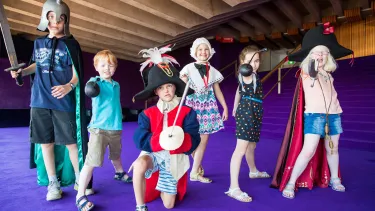 Kids wearing pirate costume.