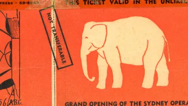An orange colour opening day ticket for Sydney opera house.