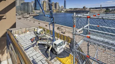 Concrete being transported into the Concert Hall with a boom pump.