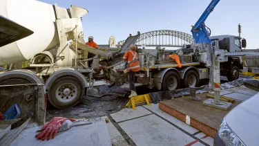 Concrete being transported into the Concert Hall with a boom pump.