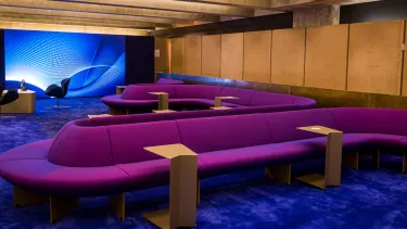 Lounge seating with tables.