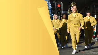 A group of construction workers on the road.